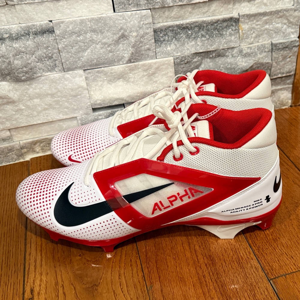 This is a Nike Alpha Menace 4 Pro football cleat in a white and red  size 14.5